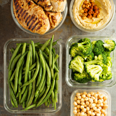 Batch-cooking for Smaller Families: Shop Wisely and Save Time & Money - Whole Family Living. Meal-prepped food neatly portioned into containers.