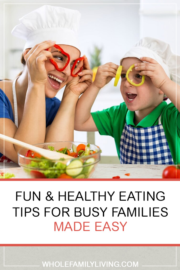 My Plate: Healthy Eating for Busy Families Made Easy. Mother and son having fun cutting up veggies in the kitchen.