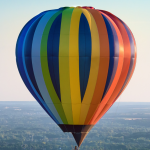 People in a hot air balloon. 7 Steps to Conquer Your Goals This Year (Without Resolutions) - Whole Family Living