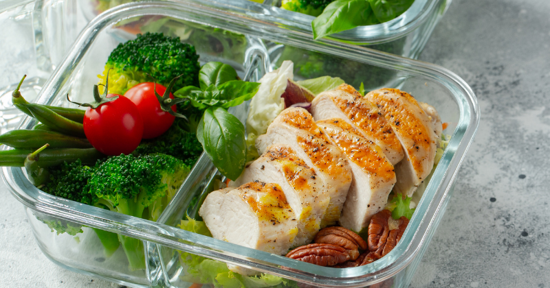 Healthy food in meal prep containers on the counter. Tips for Easy Meal Planning and Prep - Whole Family Living